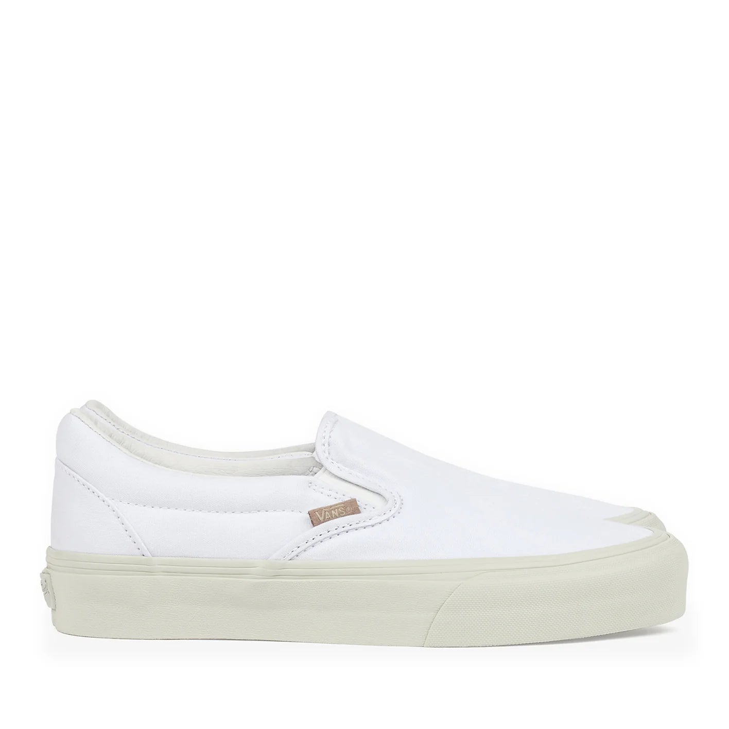 White canvas sales slip on vans