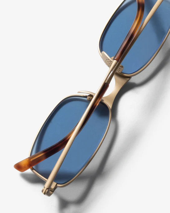 Stüssy: Men's Simon Sunglasses (Matte Gold/Lt. Blue Lens) | DSMS E Stüssy: Men's Simon Sunglasses (Matte Gold/Lt. Blue Lens) | DSMS E