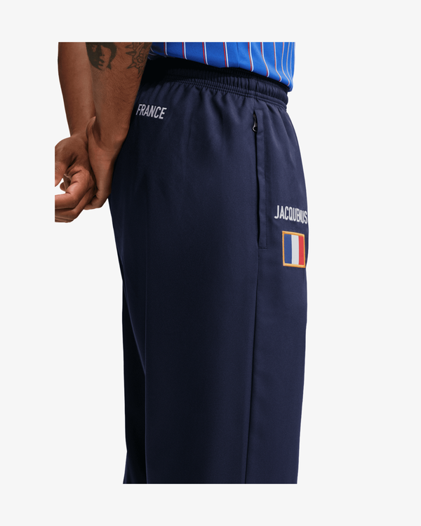 Nike - Men's Jacquemus France Reissue Track Pants- (IQ3855-498)