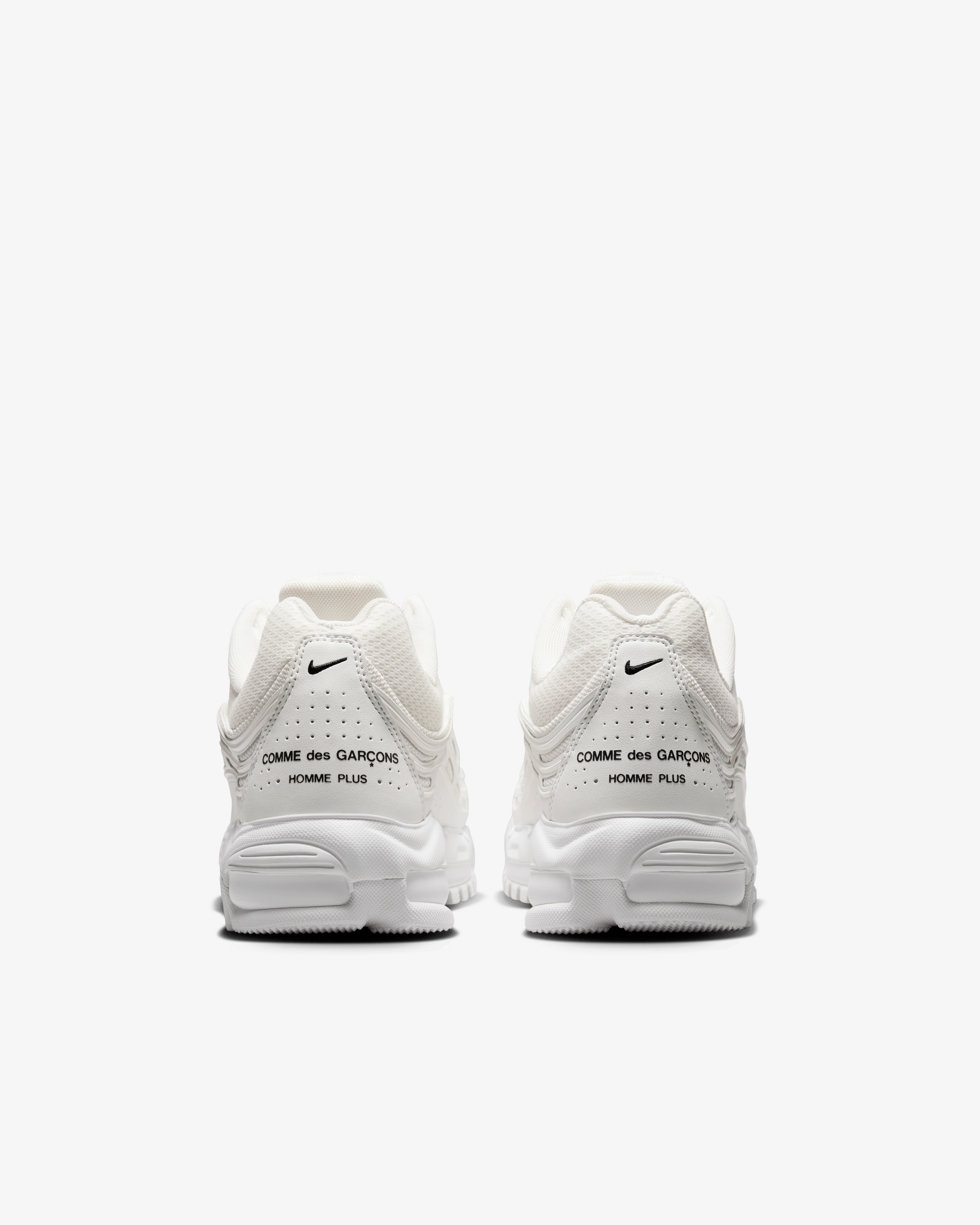 nike shox tl comme des garcons white